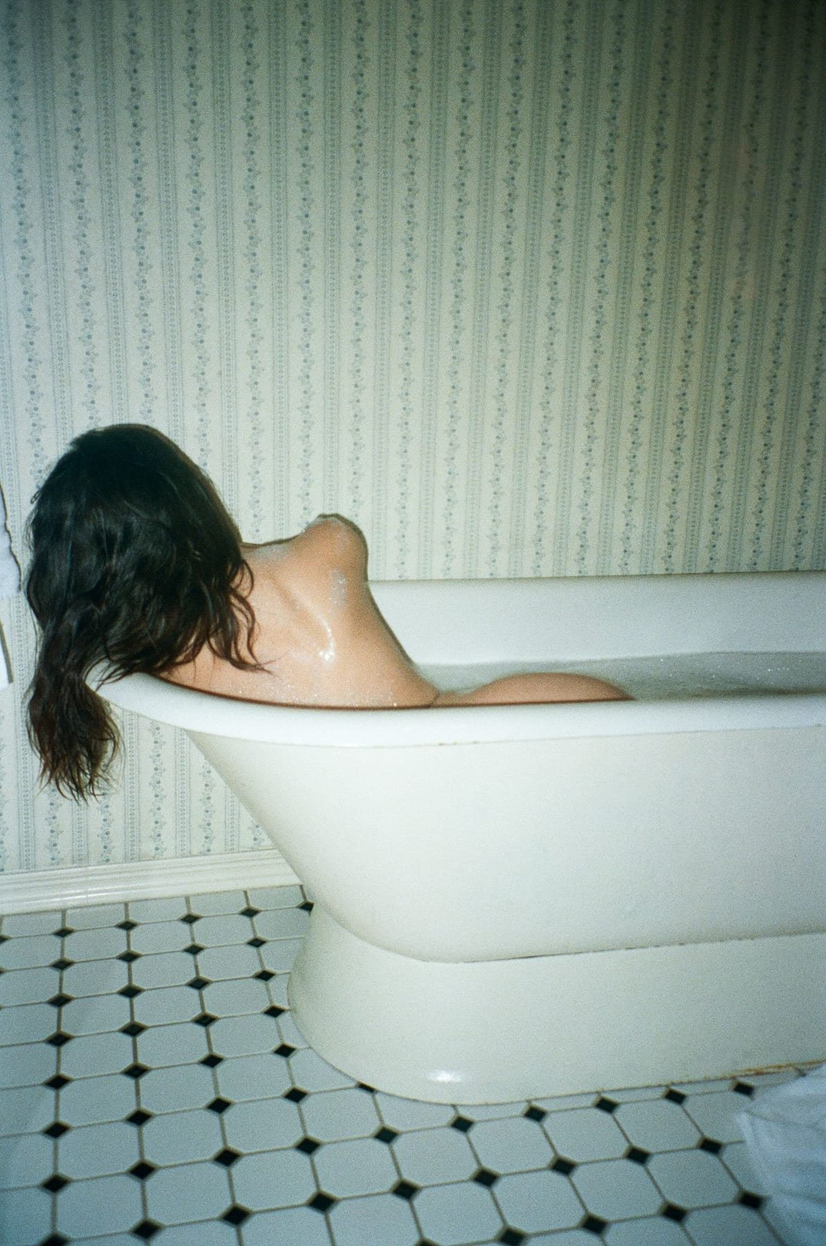Figure study in a bathtub
