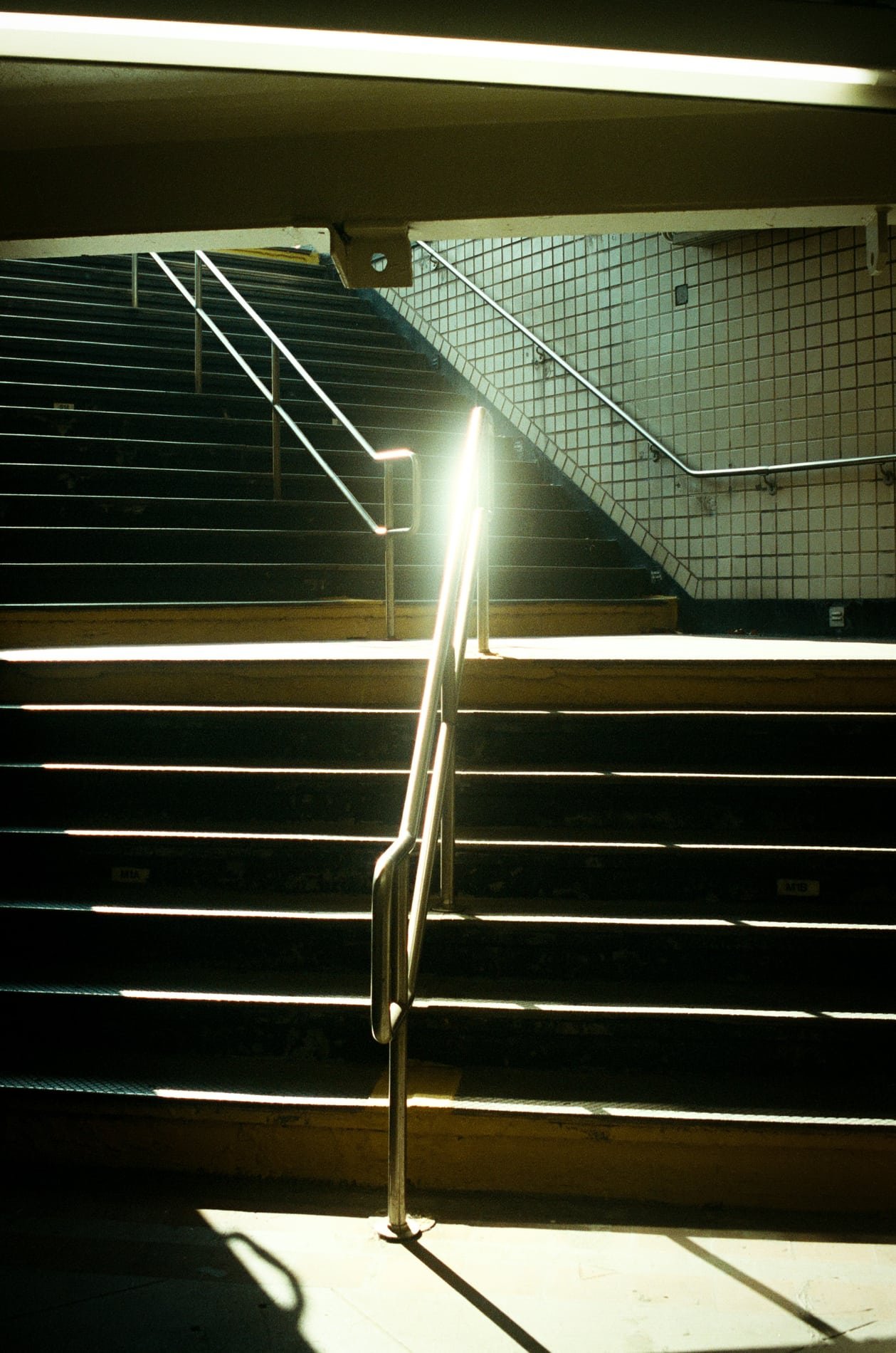 Stairwell with light on the railing